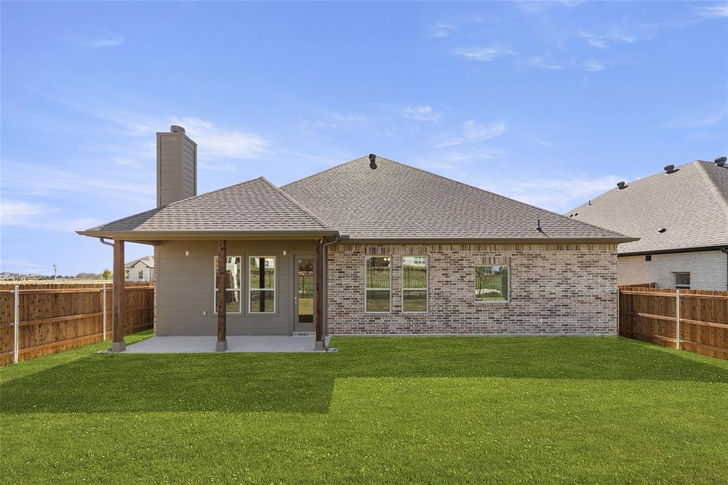 4017 Eagles Bluff Road Midlothian, TX 76065 - Photo 29 of 31 a front view of a house with a garden