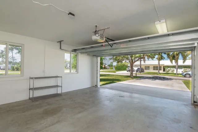 a view of an empty room with a balcony