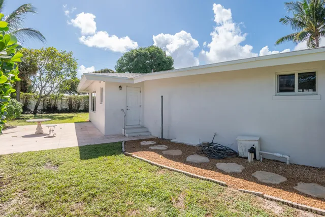 a house view with a garden space