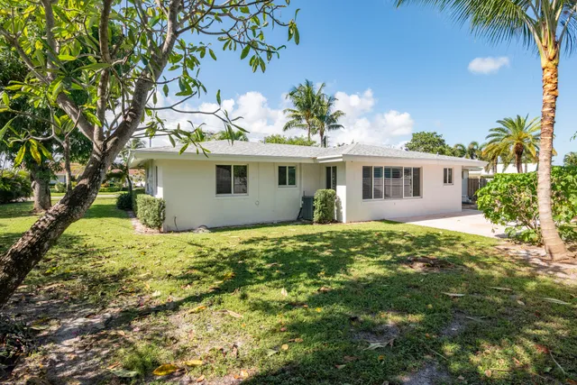 a view of a swimming pool with a garden