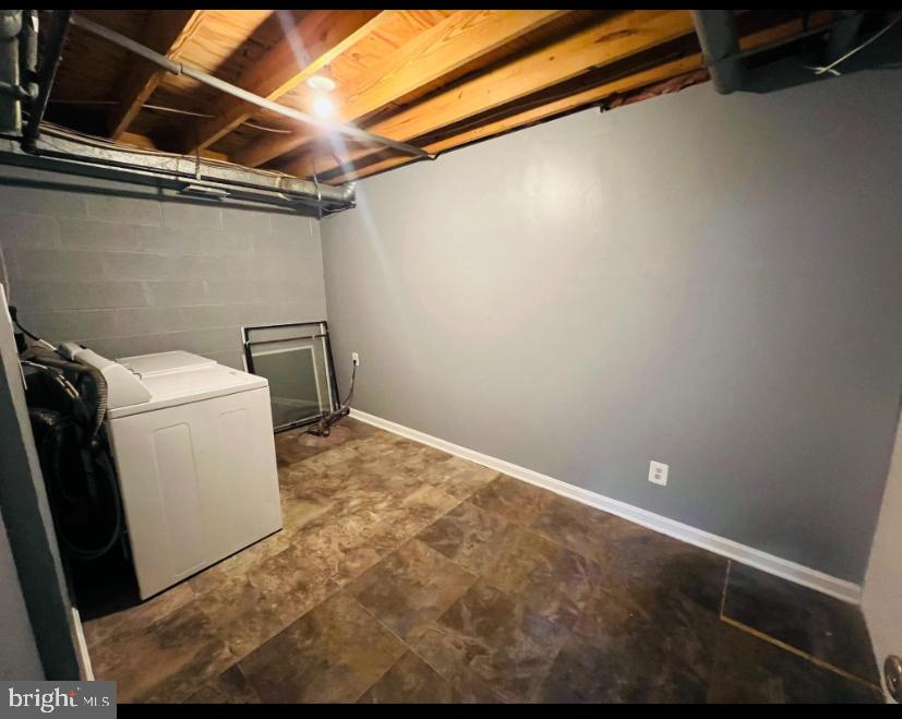 1808 North Spring Street Baltimore, MD 21213 - Photo 24 of 24 a utility room with dryer and washer