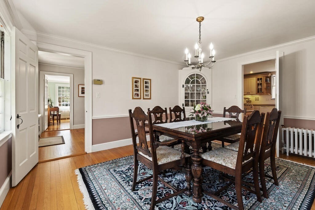 6 Lantern Lane Winchester, MA 01890 - Photo 13 of 40 a view of a a dining room with furniture window and wooden floor