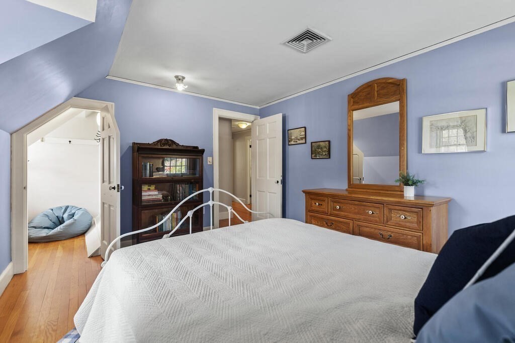 6 Lantern Lane Winchester, MA 01890 - Photo 24 of 40 a bedroom with a bed and a dresser