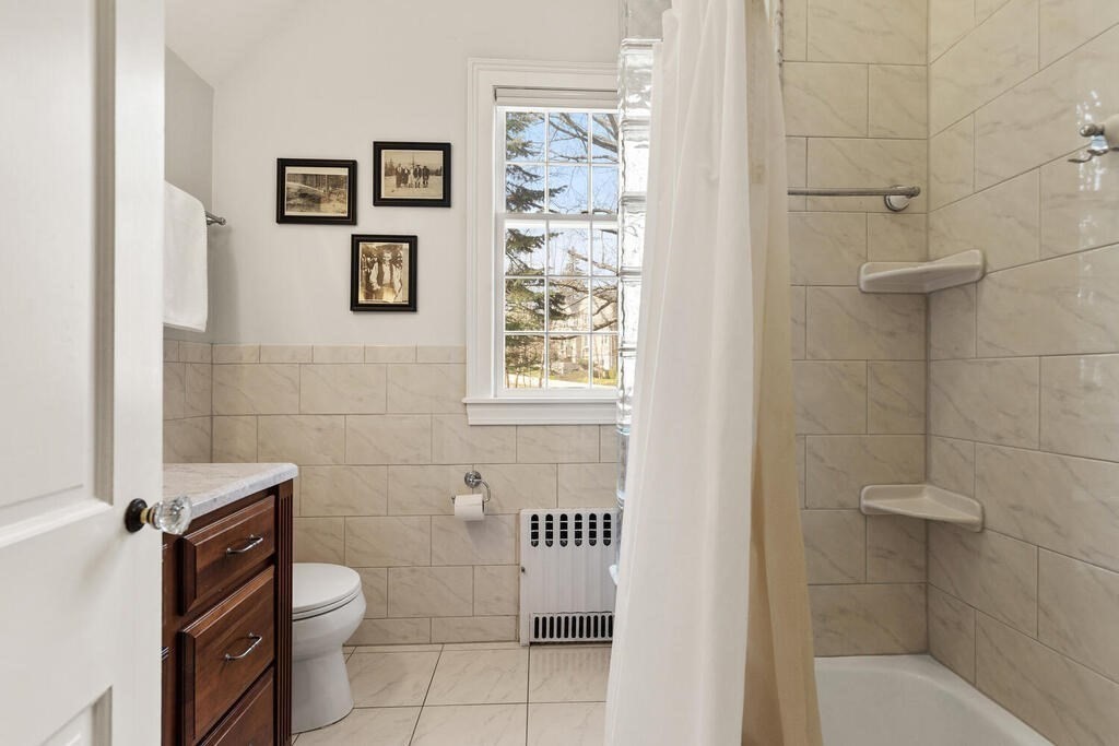 6 Lantern Lane Winchester, MA 01890 - Photo 26 of 40 a bathroom with a toilet and a shower
