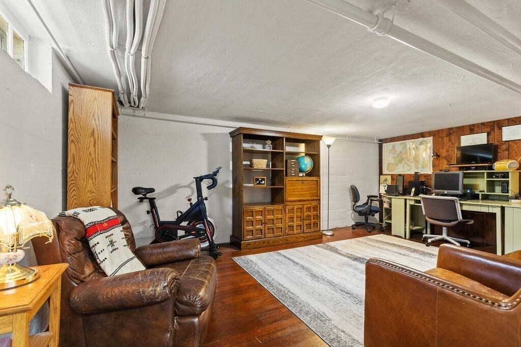 6 Lantern Lane Winchester, MA 01890 - Photo 28 of 40 a bed room with a bed and a television