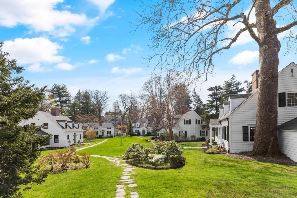 6 Lantern Lane Winchester, MA 01890 - Photo 31 of 40 a view of a house with a big yard and large trees