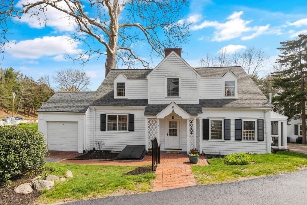 6 Lantern Lane Winchester, MA 01890 - Photo 34 of 40 a front view of a house with yard and green space