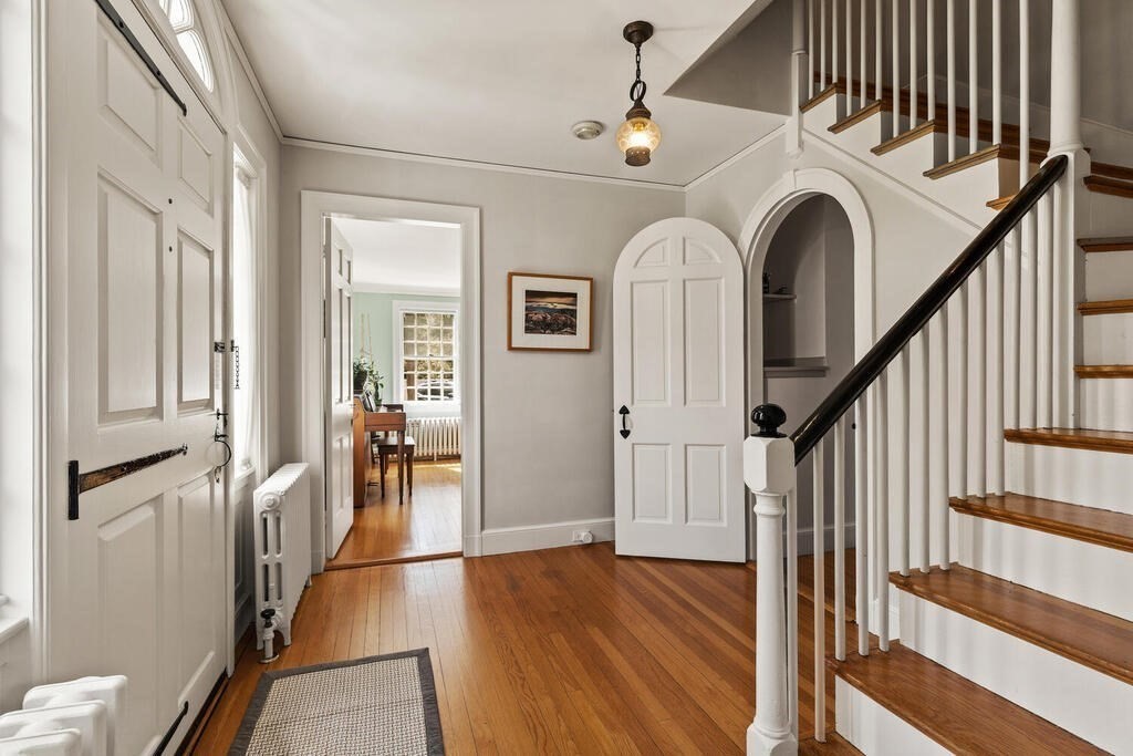 6 Lantern Lane Winchester, MA 01890 - Photo 8 of 40 a view of entryway and hall with wooden floor