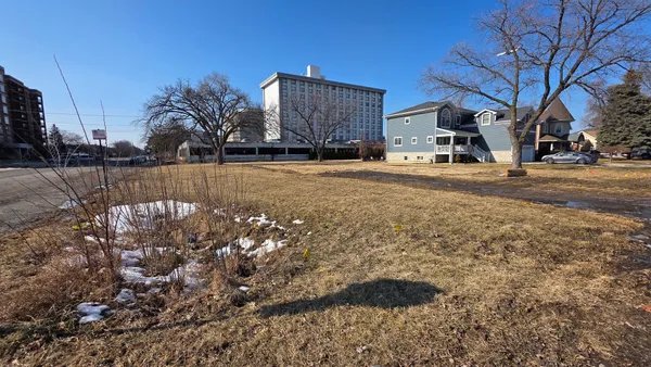 a view of a street with houses