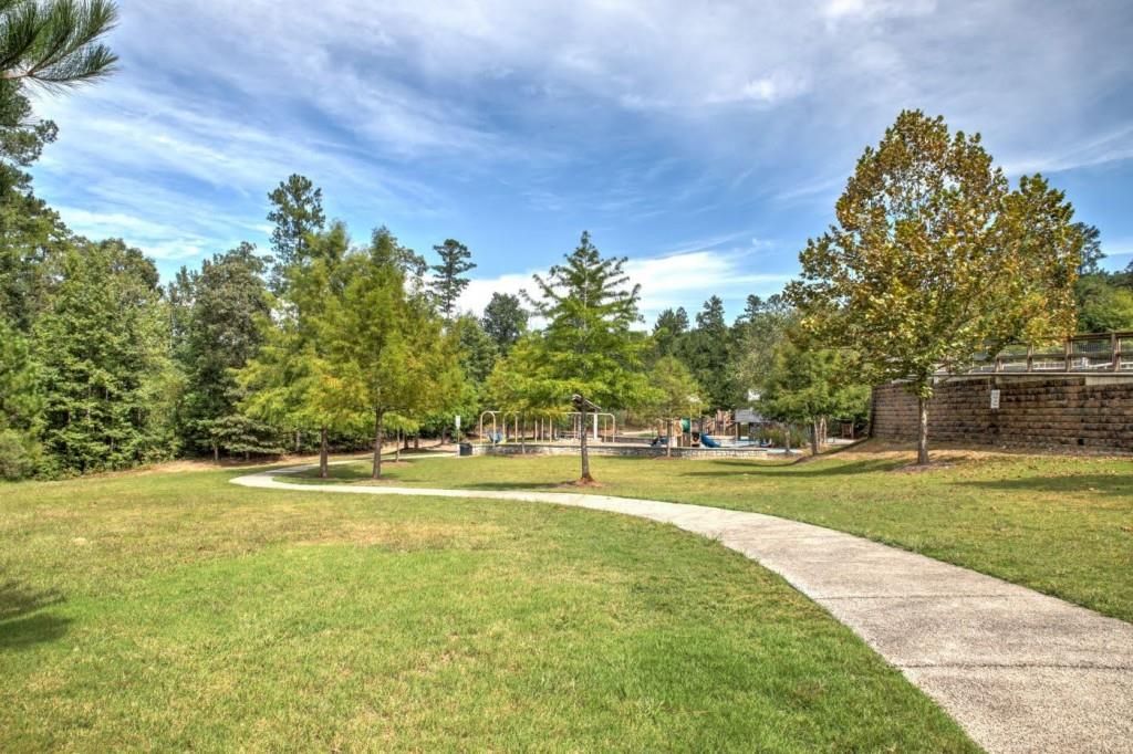 4240 Cavalier Way Duluth, GA 30097 - Photo 46 of 46 a yard with lots of trees and plants