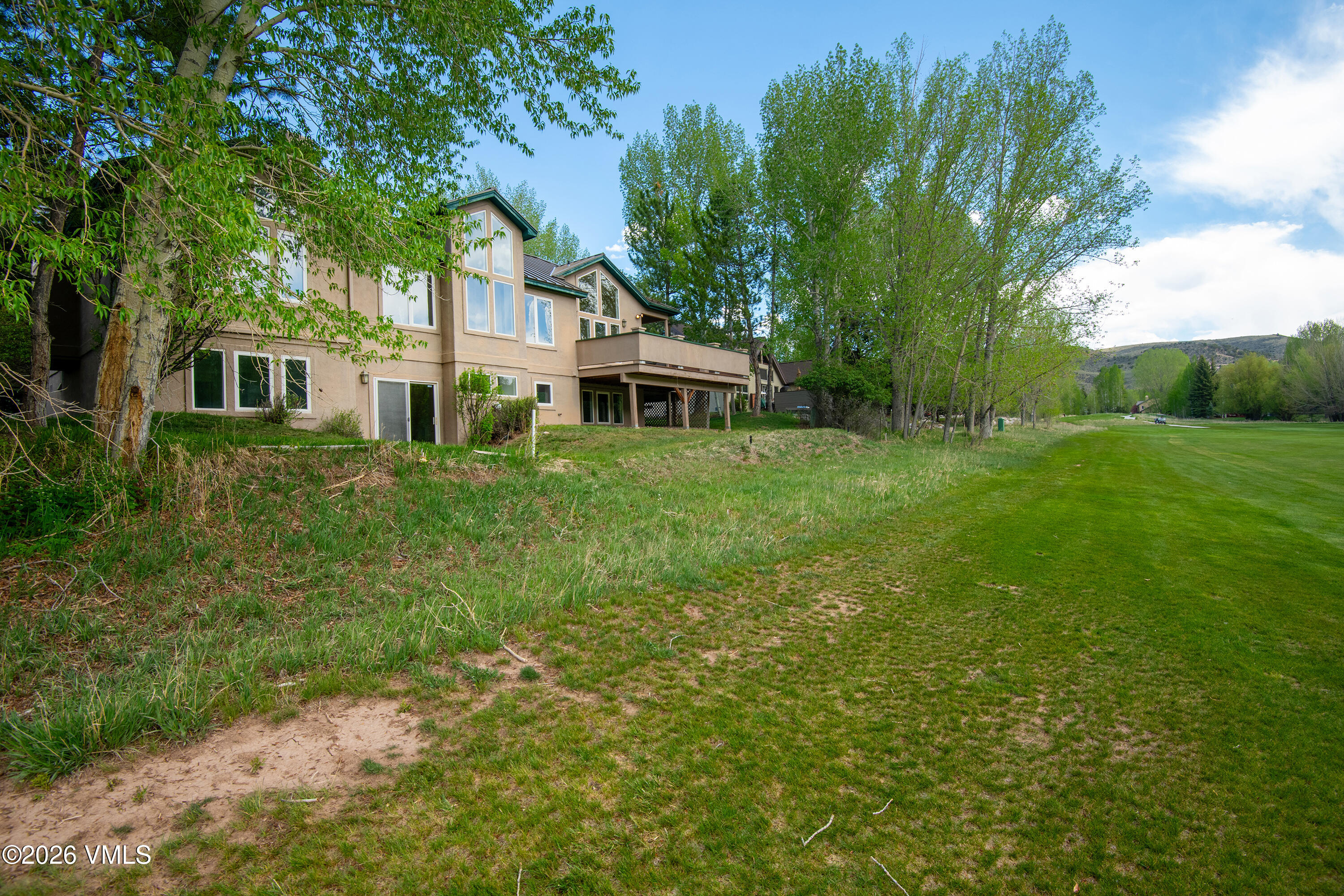 471 Rawhide Road Edwards, CO 81632 - Photo 48 of 51 a front view of a house with a garden