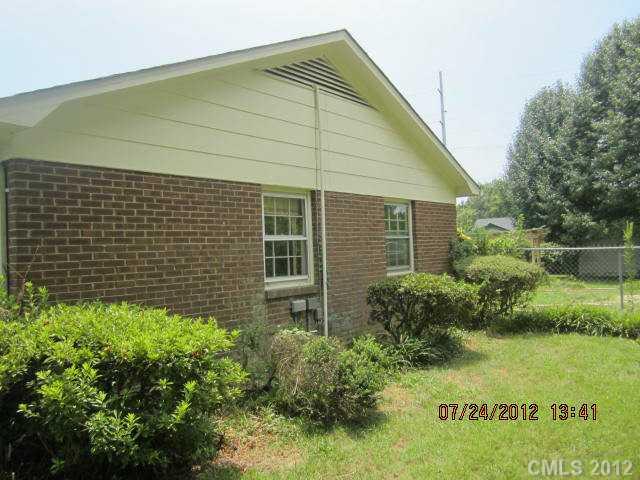 8003 Wynnview Road Indian Trail, NC 28079 - Photo 2 of 10 a house view with a backyard space