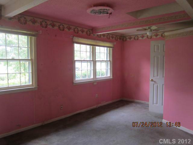 8003 Wynnview Road Indian Trail, NC 28079 - Photo 8 of 10 a view of a livingroom with an empty space and a window