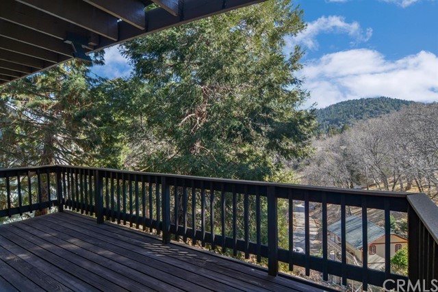 347 Donner Drive Crestline, CA 92325 - Photo 21 of 27 a balcony with wooden floor