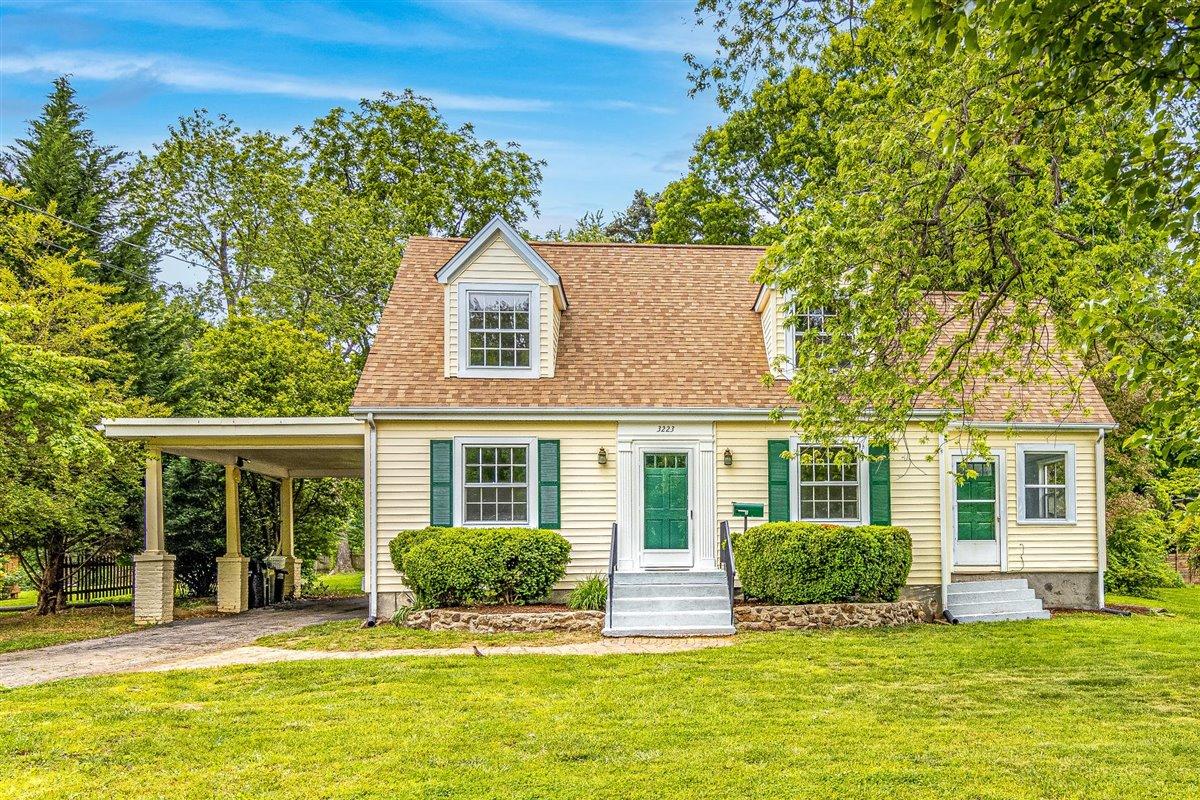 front view of a house with a yard