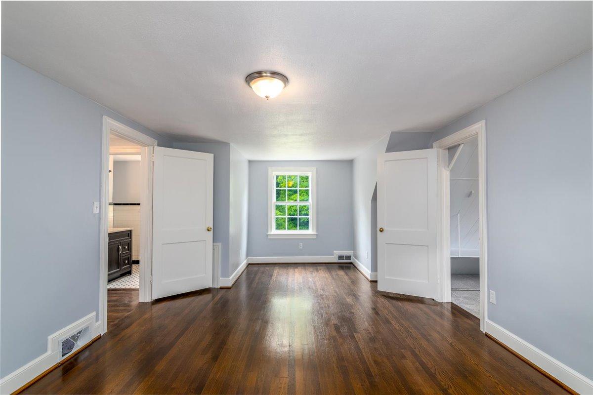 3223 Lawndale Road Roanoke, VA 24018 - Photo 20 of 37 an empty room with wooden floor and windows