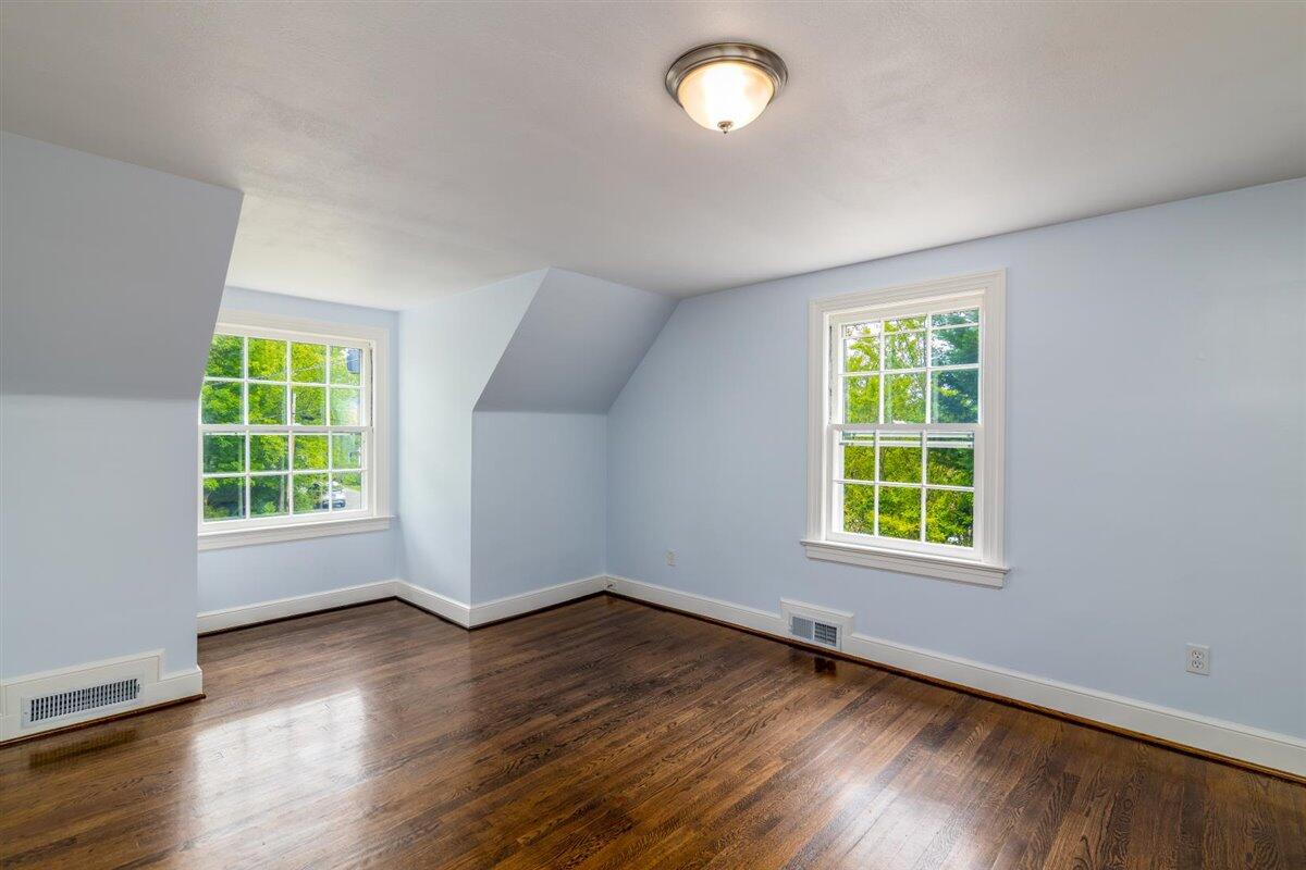 3223 Lawndale Road Roanoke, VA 24018 - Photo 23 of 37 an empty room with wooden floor and windows