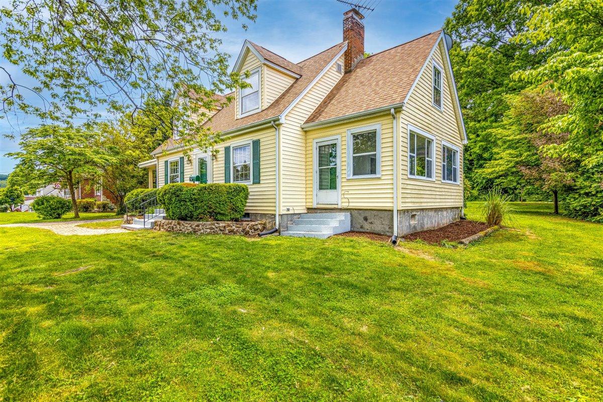 3223 Lawndale Road Roanoke, VA 24018 - Photo 31 of 37 a front view of a house with a yard