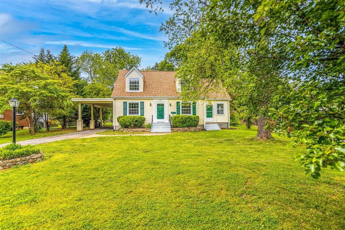 3223 Lawndale Road Roanoke, VA 24018 - Photo 37 of 37 a front view of a house with a garden