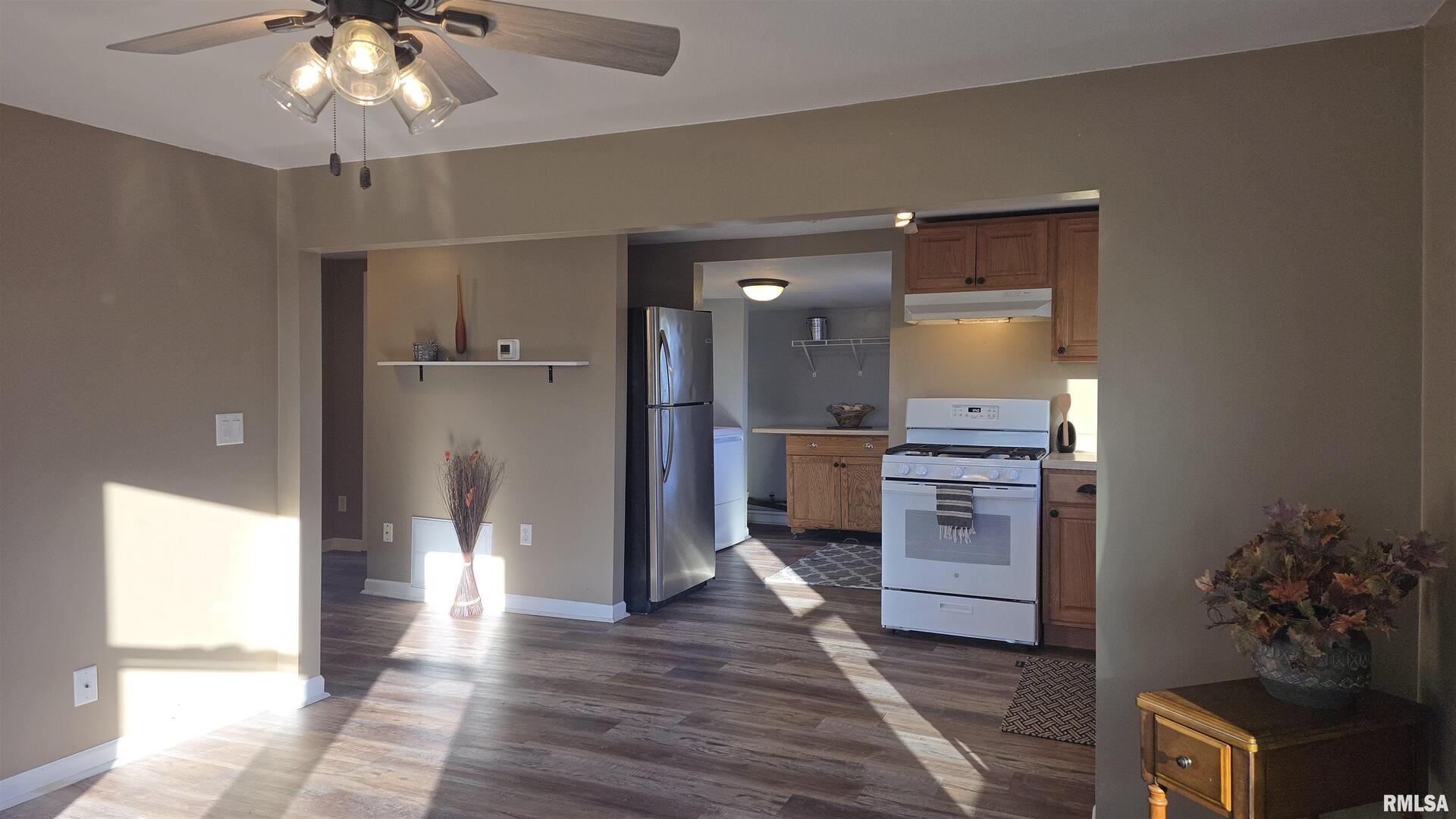 1006 8th Street Colona, IL 61241 - Photo 3 of 16 a view of a kitchen cabinets and wooden floor