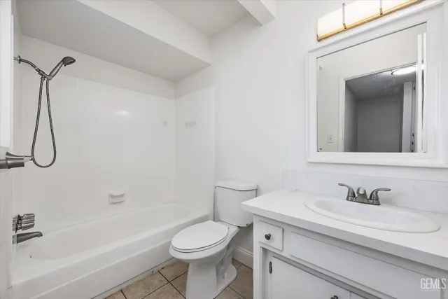a bathroom with a sink a toilet and a bathtub