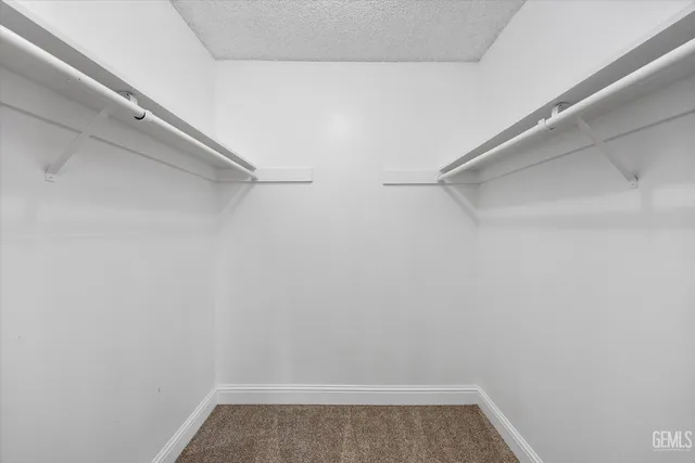 a view of small space with racks on the wall