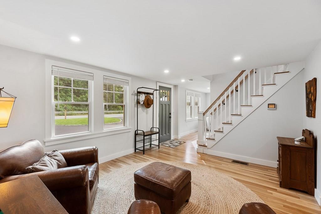 68 Still River Road Harvard, MA 01451 - Photo 16 of 40 a living room with furniture and a hard wood floor