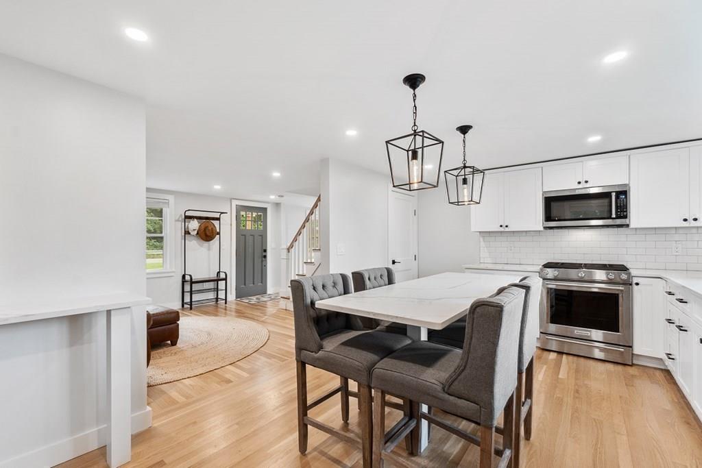 68 Still River Road Harvard, MA 01451 - Photo 20 of 40 a view of a dining room with furniture