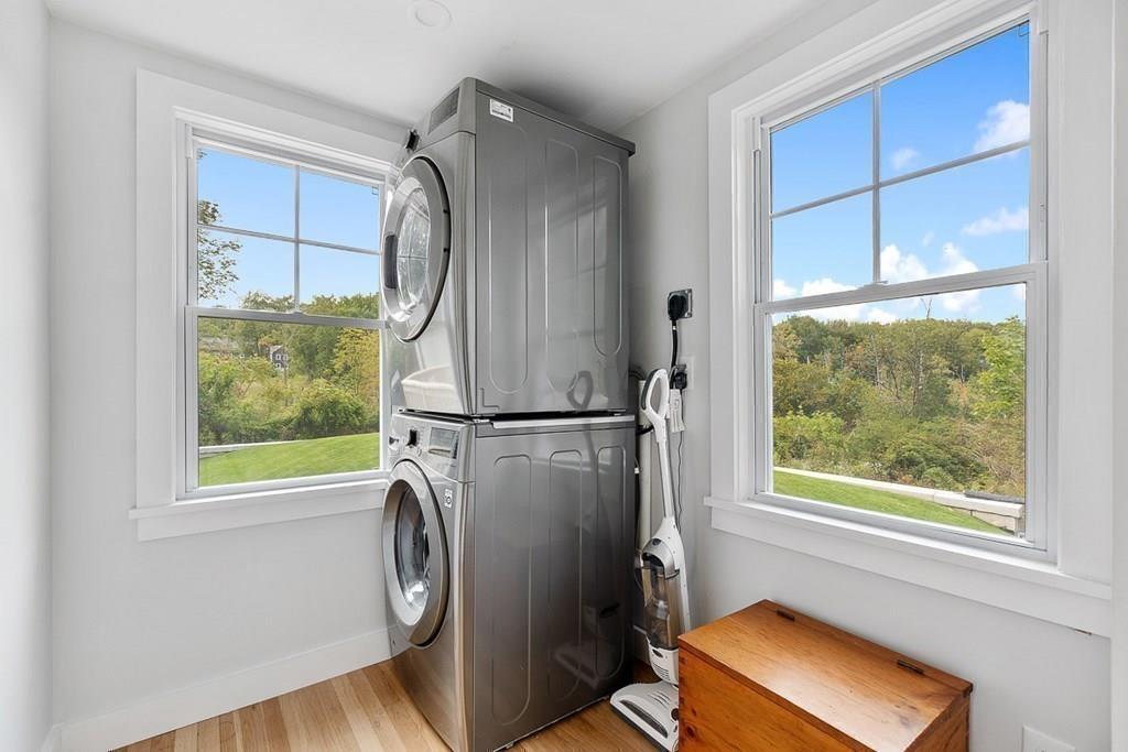 68 Still River Road Harvard, MA 01451 - Photo 25 of 40 a view of storage and utility room with washer and dryer