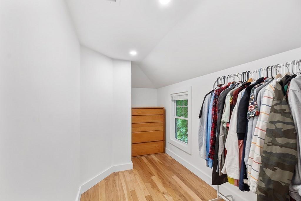 68 Still River Road Harvard, MA 01451 - Photo 34 of 40 a view of walk in closet with clothes