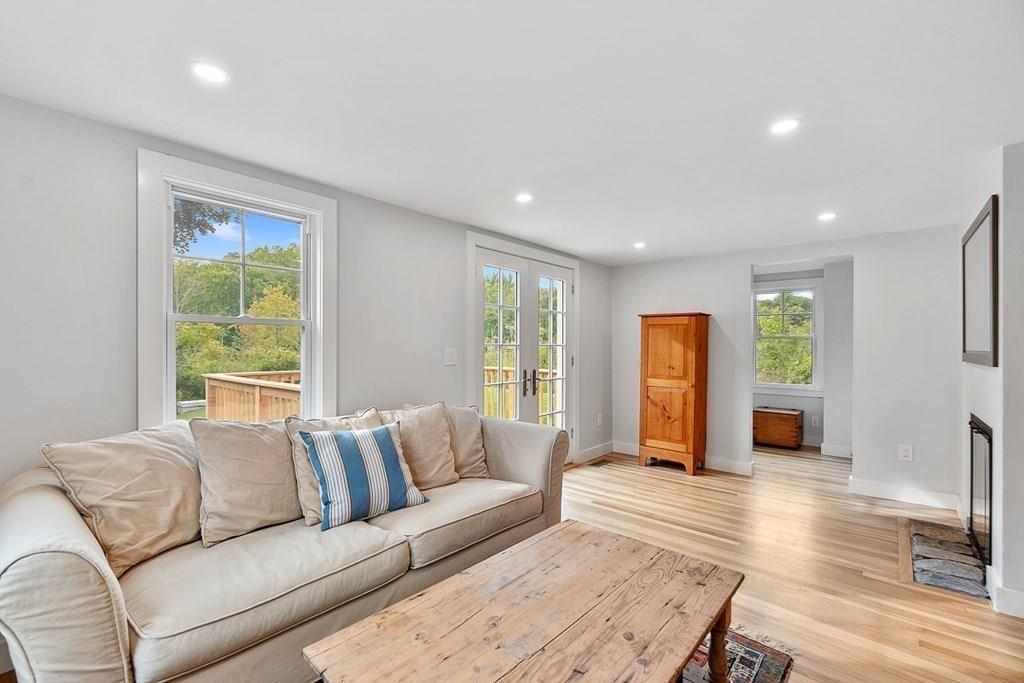 68 Still River Road Harvard, MA 01451 - Photo 8 of 40 a living room with furniture and a window