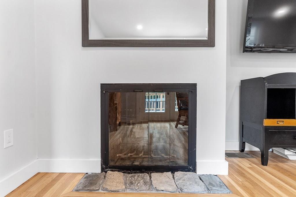 68 Still River Road Harvard, MA 01451 - Photo 9 of 40 a view of a livingroom with furniture and wooden floor