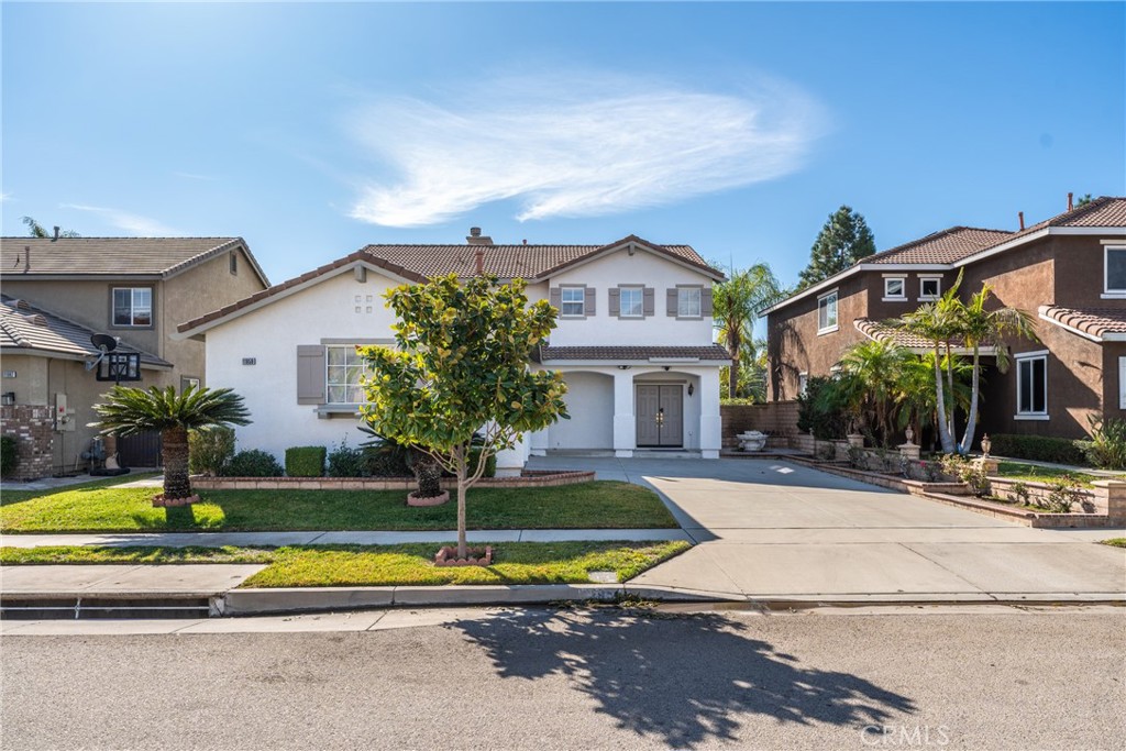 11959 Huntley Drive Rancho Cucamonga, CA 91739 - Photo 1 of 1 a view of a house with swimming pool and a yard