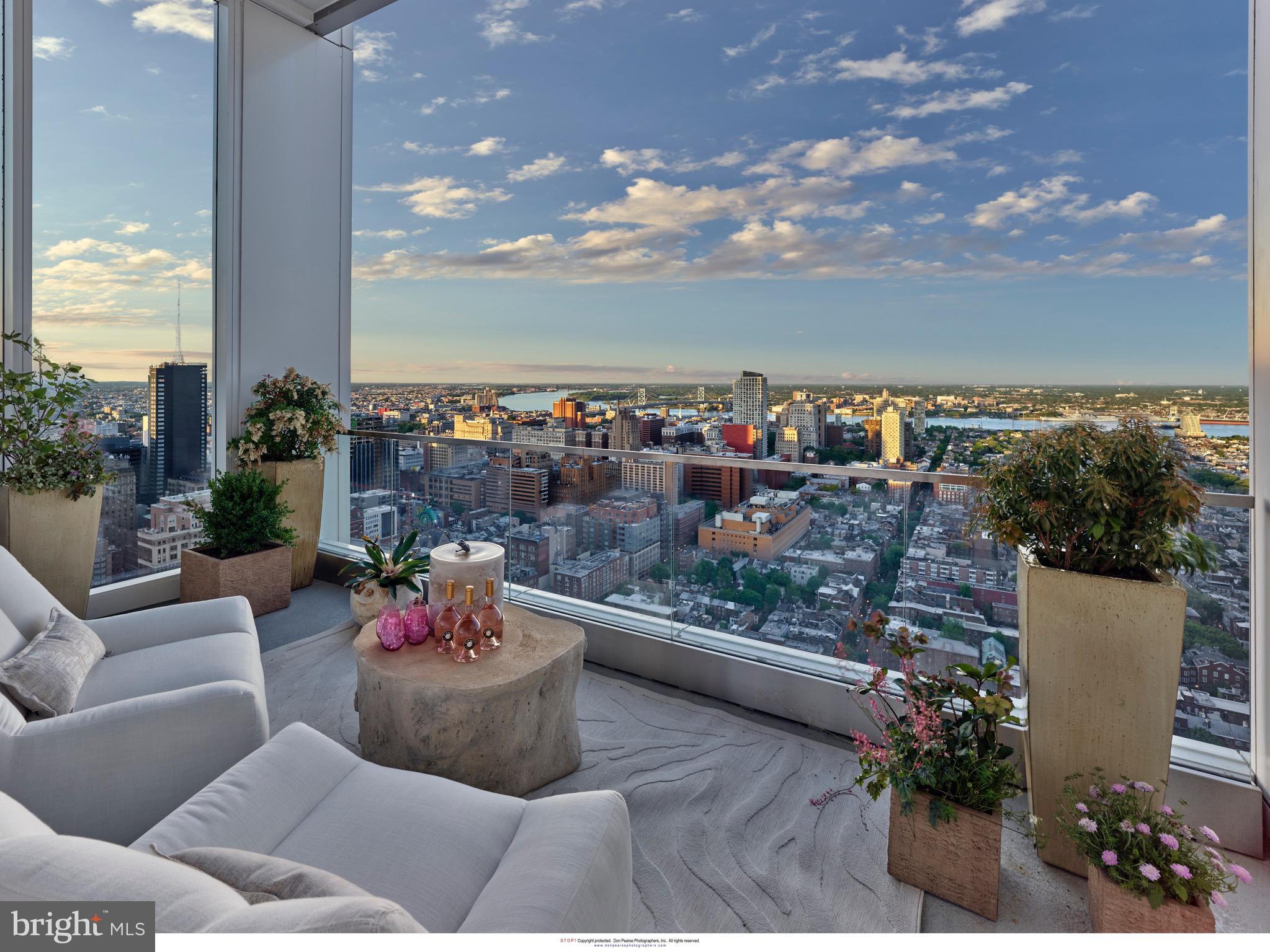 301 South Broad Street, Unit 4101 Philadelphia, PA 19107 - Photo 10 of 23 warm sunrise views off the Owners suite balcony