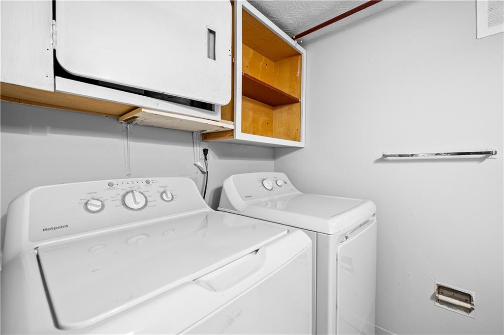 2956 North Dekalb Drive, Unit C Atlanta, GA 30340 - Photo 14 of 25 a utility room with dryer and washer