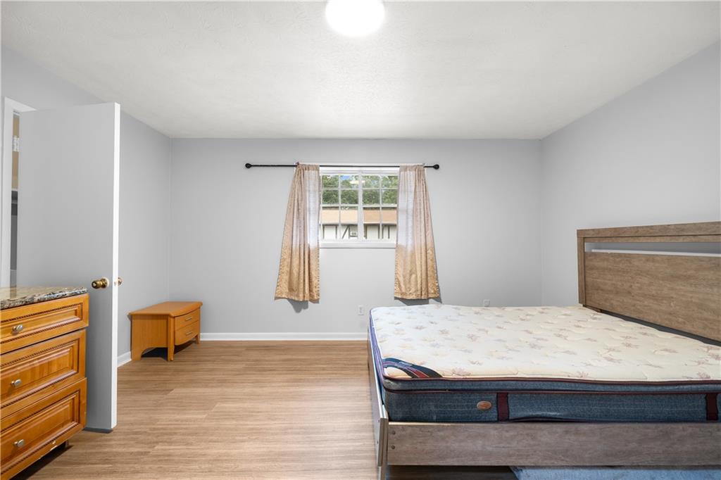2956 North Dekalb Drive, Unit C Atlanta, GA 30340 - Photo 15 of 25 a living room with couch and a window