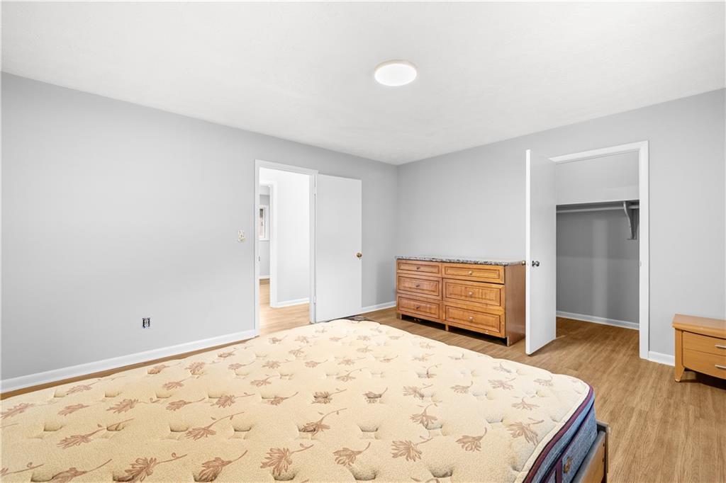 2956 North Dekalb Drive, Unit C Atlanta, GA 30340 - Photo 17 of 25 a view of a room with wooden floor and bedroom