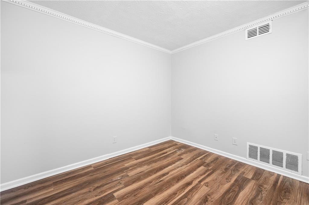 2956 North Dekalb Drive, Unit C Atlanta, GA 30340 - Photo 4 of 25 a view of a room with wooden floor