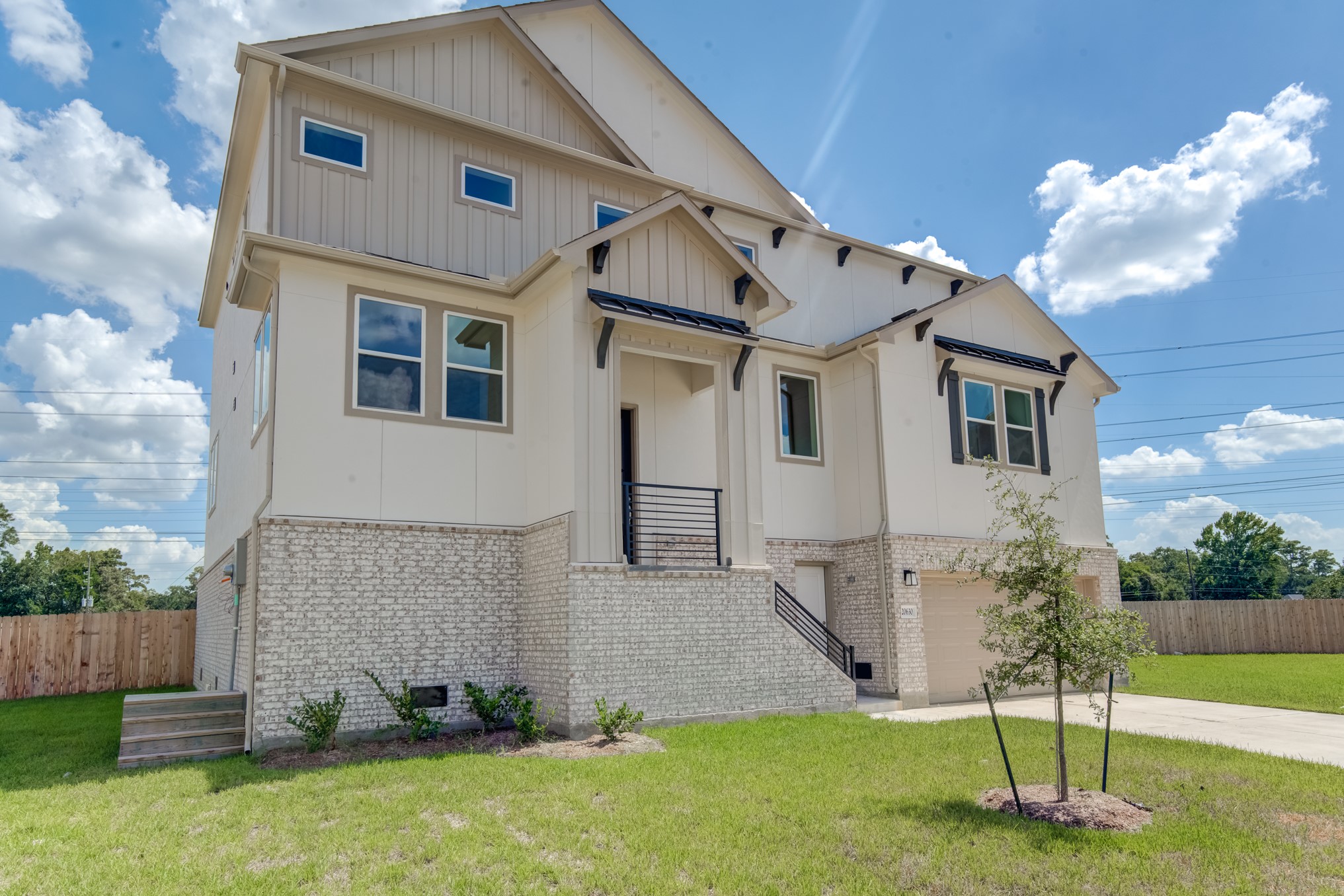 20630 Dynamic Court Humble, TX 77338 - Photo 3 of 28 a front view of a house with a yard