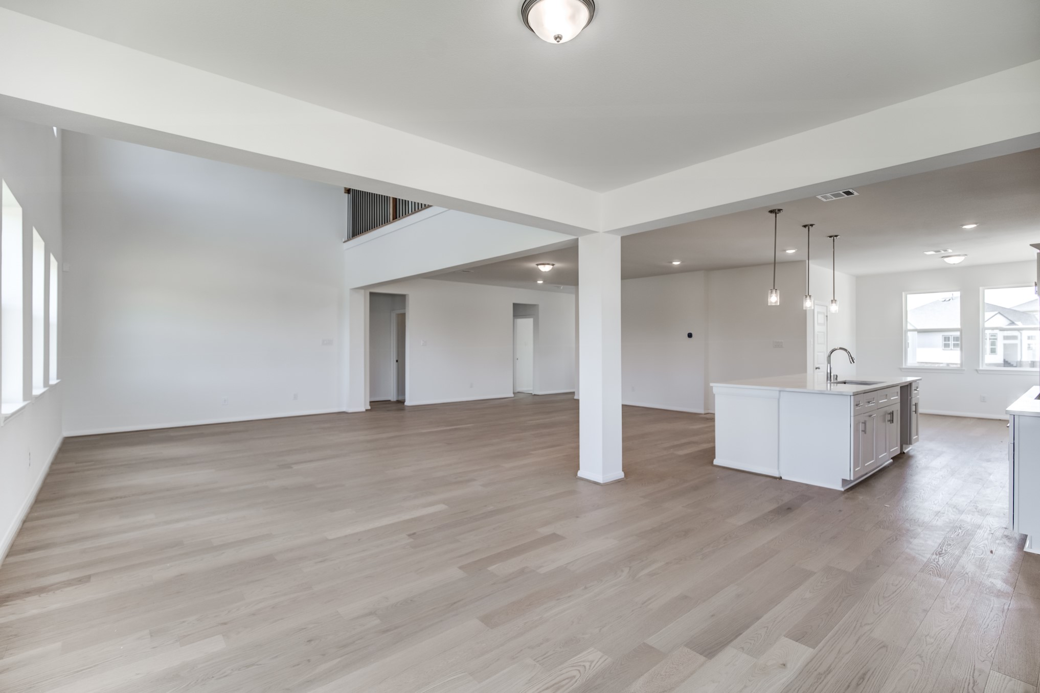 20630 Dynamic Court Humble, TX 77338 - Photo 5 of 28 a view of an empty room with a kitchen