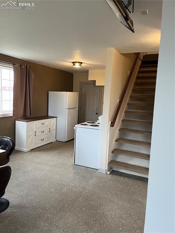 136 Black Knat Road Fairplay, CO 80440 - Photo 27 of 38 a view of an empty room with stairs and stairs