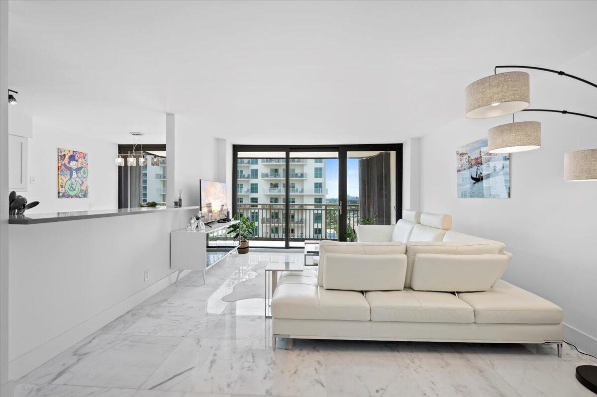 3400 North Ocean Drive, Unit 1806 Singer Island, FL 33404 - Photo 3 of 55 a living room with furniture and a large window