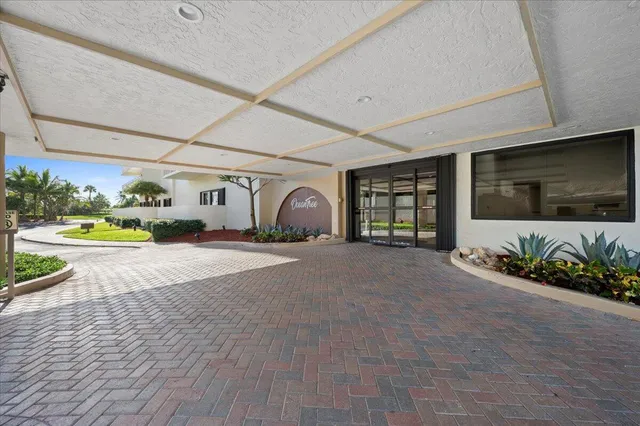 a big room with closet and a kitchen view