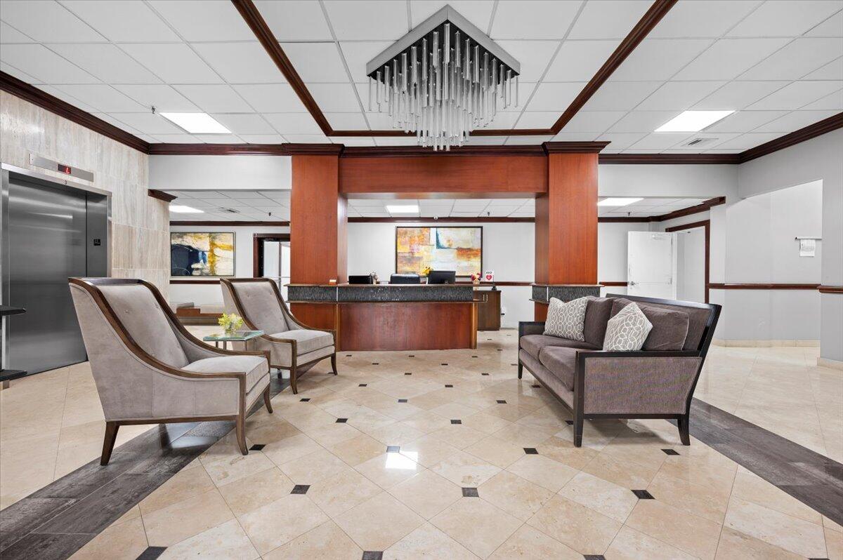 3400 North Ocean Drive, Unit 1806 Singer Island, FL 33404 - Photo 38 of 55 a living room with furniture and wooden floor