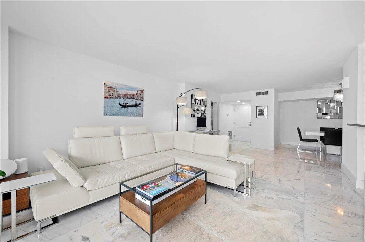 3400 North Ocean Drive, Unit 1806 Singer Island, FL 33404 - Photo 4 of 55 a living room with furniture and a couch