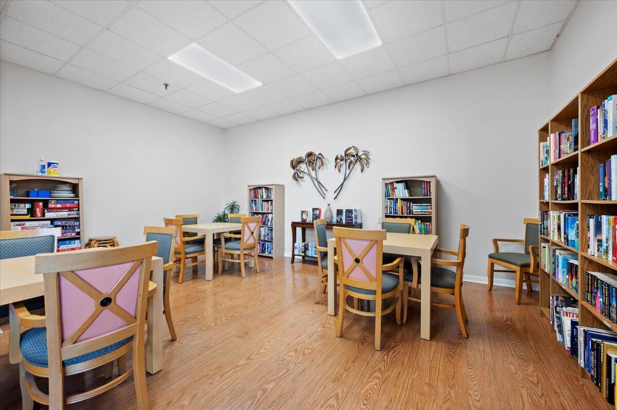 3400 North Ocean Drive, Unit 1806 Singer Island, FL 33404 - Photo 43 of 55 a dining room with furniture and wooden floor