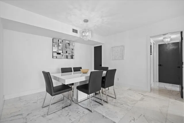 a view of a livingroom with furniture and window