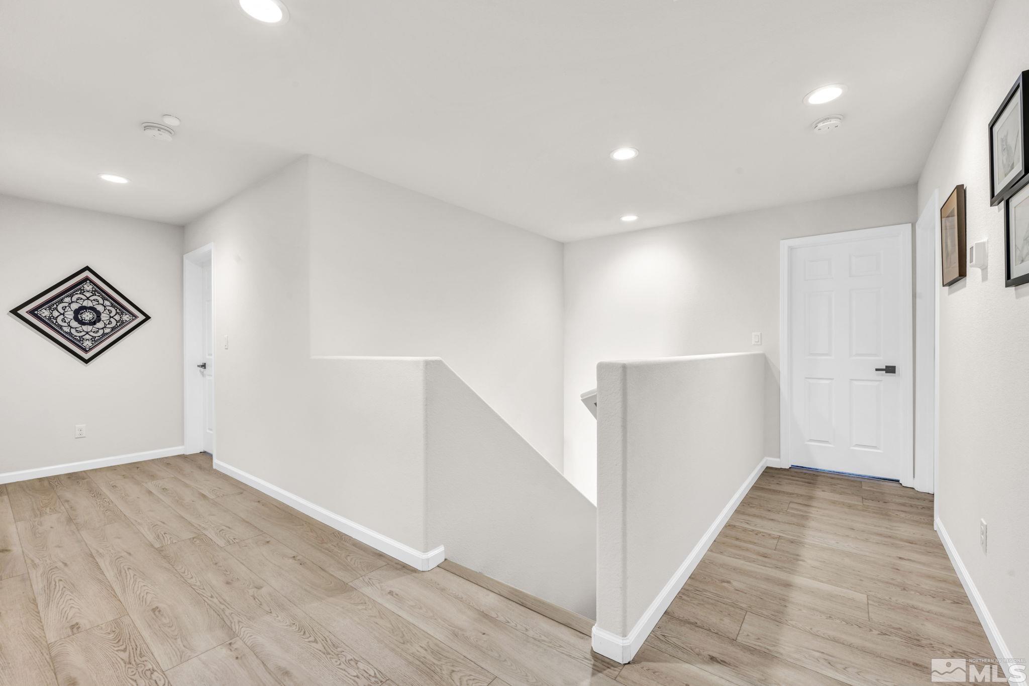 1433 Washington Street Reno, NV 89503 - Photo 20 of 35 a view of a hallway with wooden floor