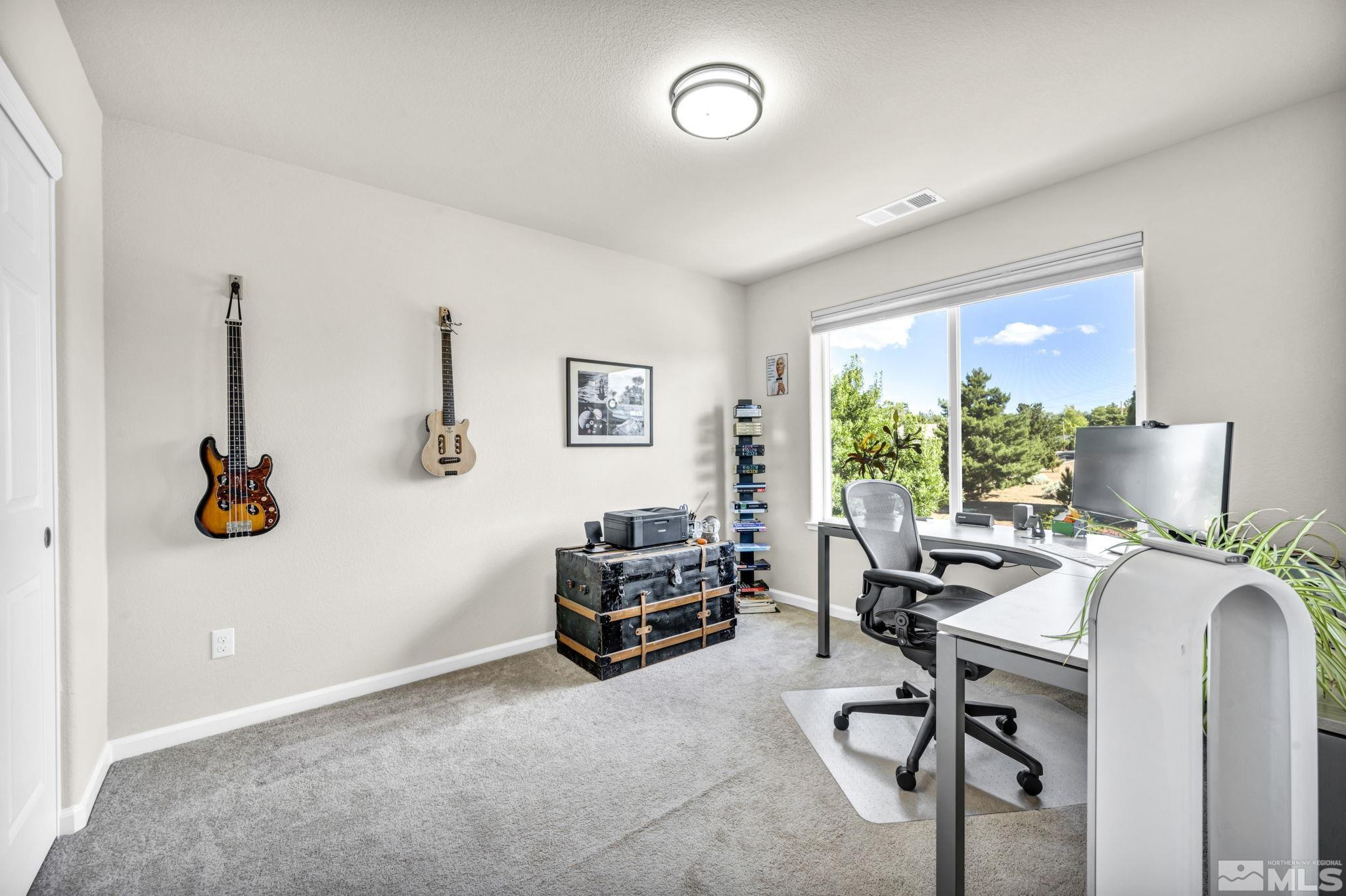 1433 Washington Street Reno, NV 89503 - Photo 33 of 35 a view of a workspace with furniture and a window