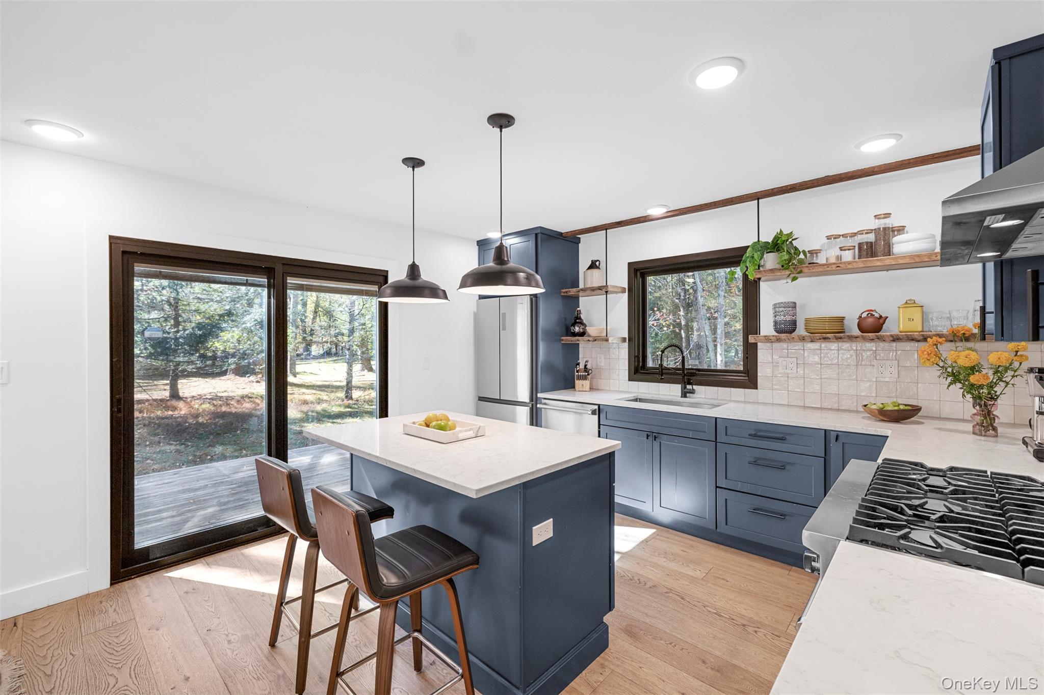 90 Van Dale Road Woodstock, NY 12498 - Photo 16 of 49 a large kitchen with a table and chairs